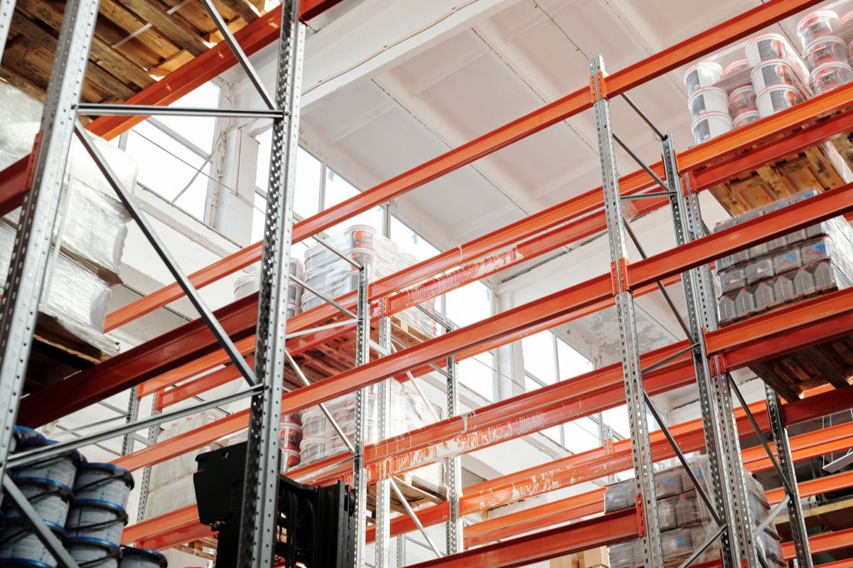 Seafood distribution warehouse with refrigerated trucks and pallets of fresh seafood